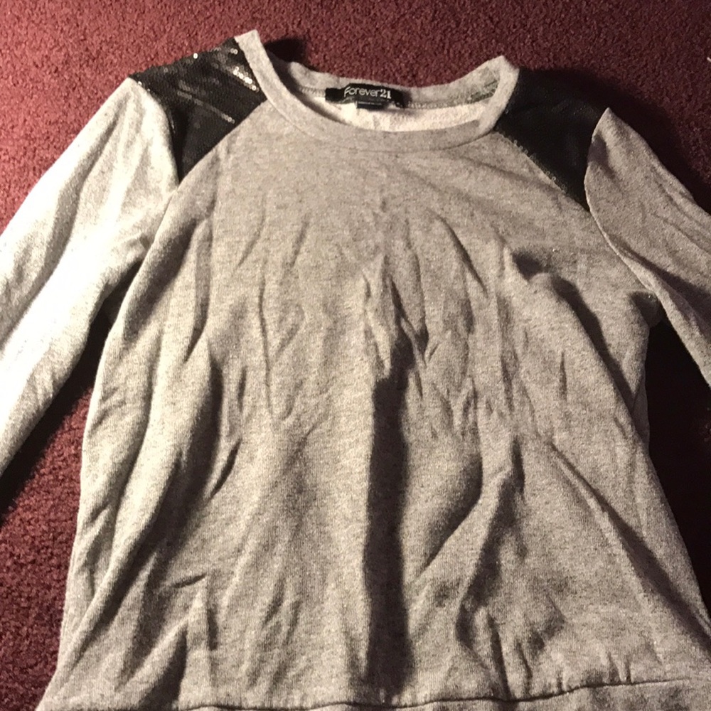 A gray and black long sleeve